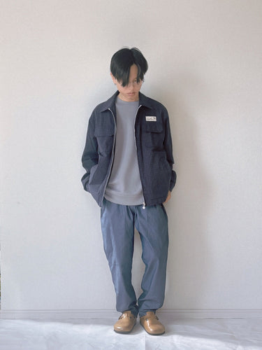 裏ロゴが映えるジップアウター×パーマーチェック切り替えスウェット